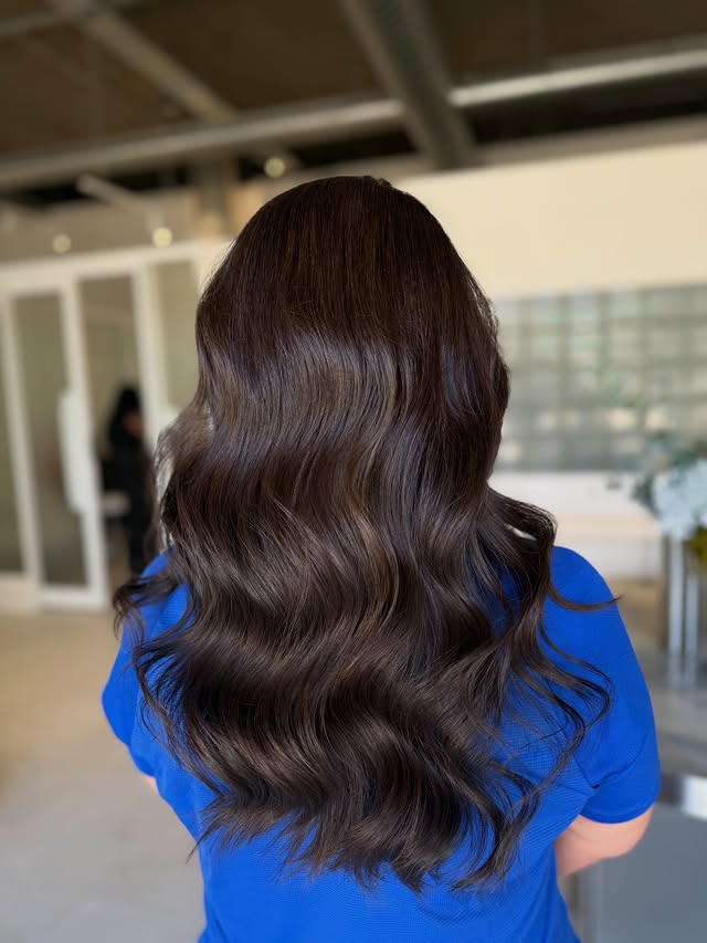 Long flowing hair styled with Cloud Nine